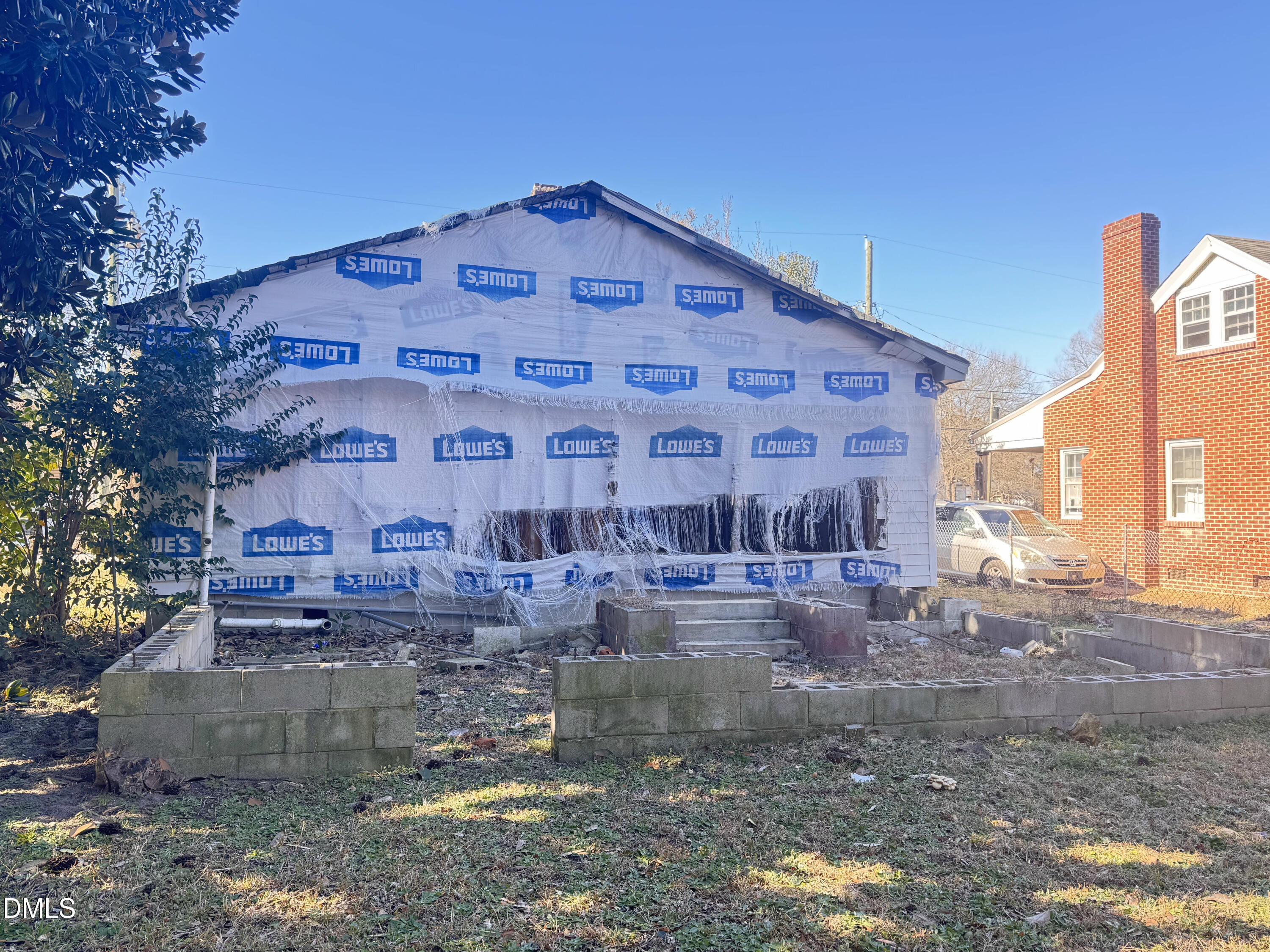 1311 Branch Street Rocky Mount, NC 27801 - Photo 19 of 22 a view of a large building with a yard