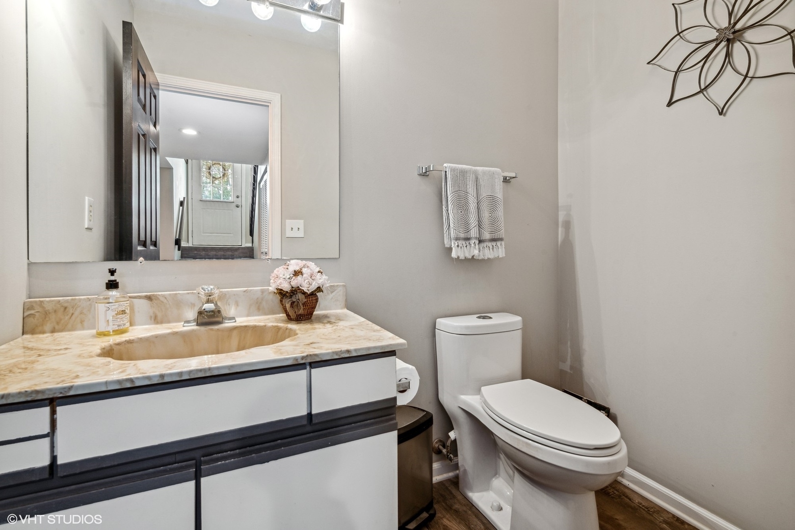 513 Hunters Way Fox River Grove, IL 60021 - Photo 14 of 16 a bathroom with a granite countertop toilet sink and mirror