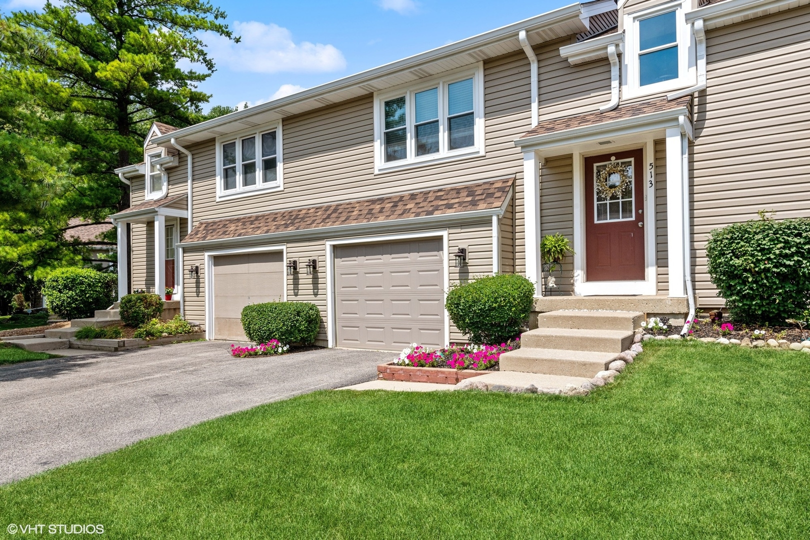 513 Hunters Way Fox River Grove, IL 60021 - Photo 2 of 16 a front view of a house with a yard