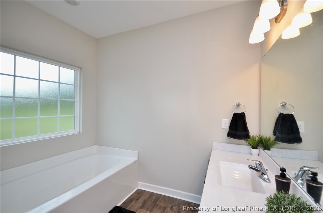 1865 John B Carter Road Fayetteville, NC 28312 - Photo 21 of 49 a bathroom with a tub