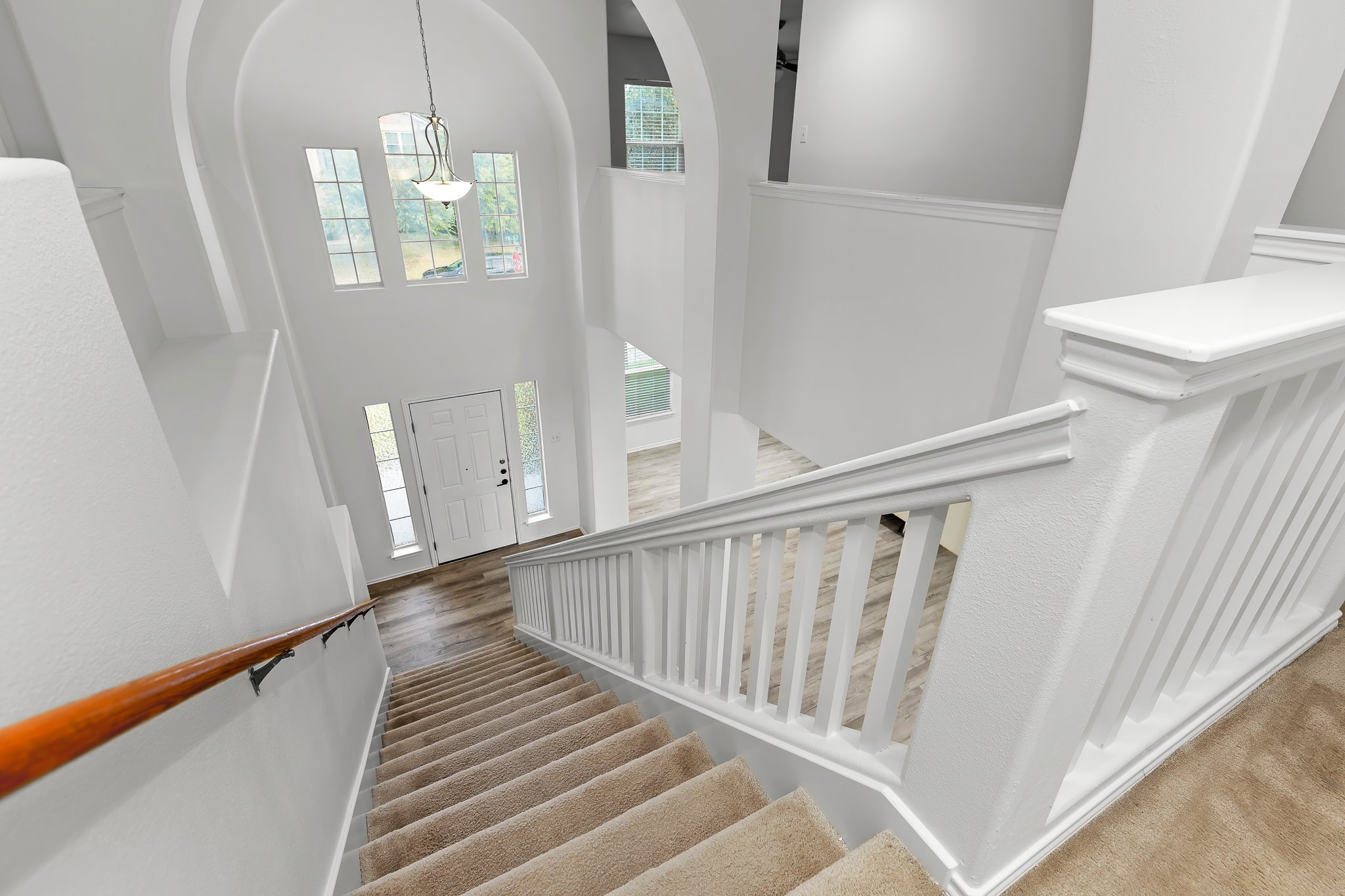6700 Tulloch Way Austin, TX 78754 - Photo 24 of 39 a view of entryway and hall with wooden floor