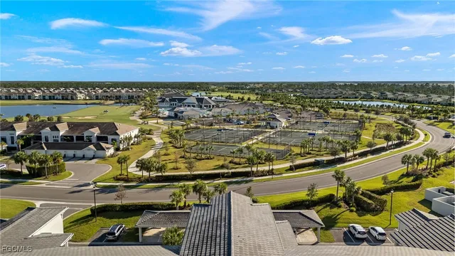 an aerial view of a house with a outdoor space swimming pool