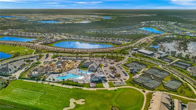 a view of a swimming pool with an outdoor seating