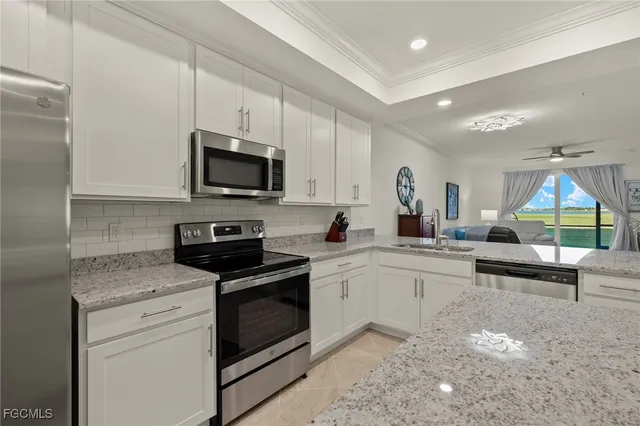 a kitchen with a stove and a microwave