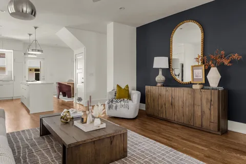 a kitchen with granite countertop a sink and a stove