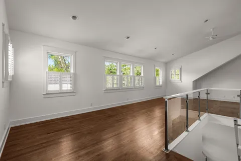 a bathroom with a sink toilet and a mirror