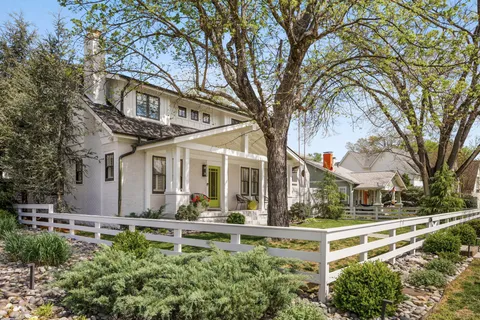 a house that has a lot of plants in it