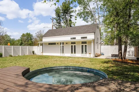 an aerial view of residential building with parking space