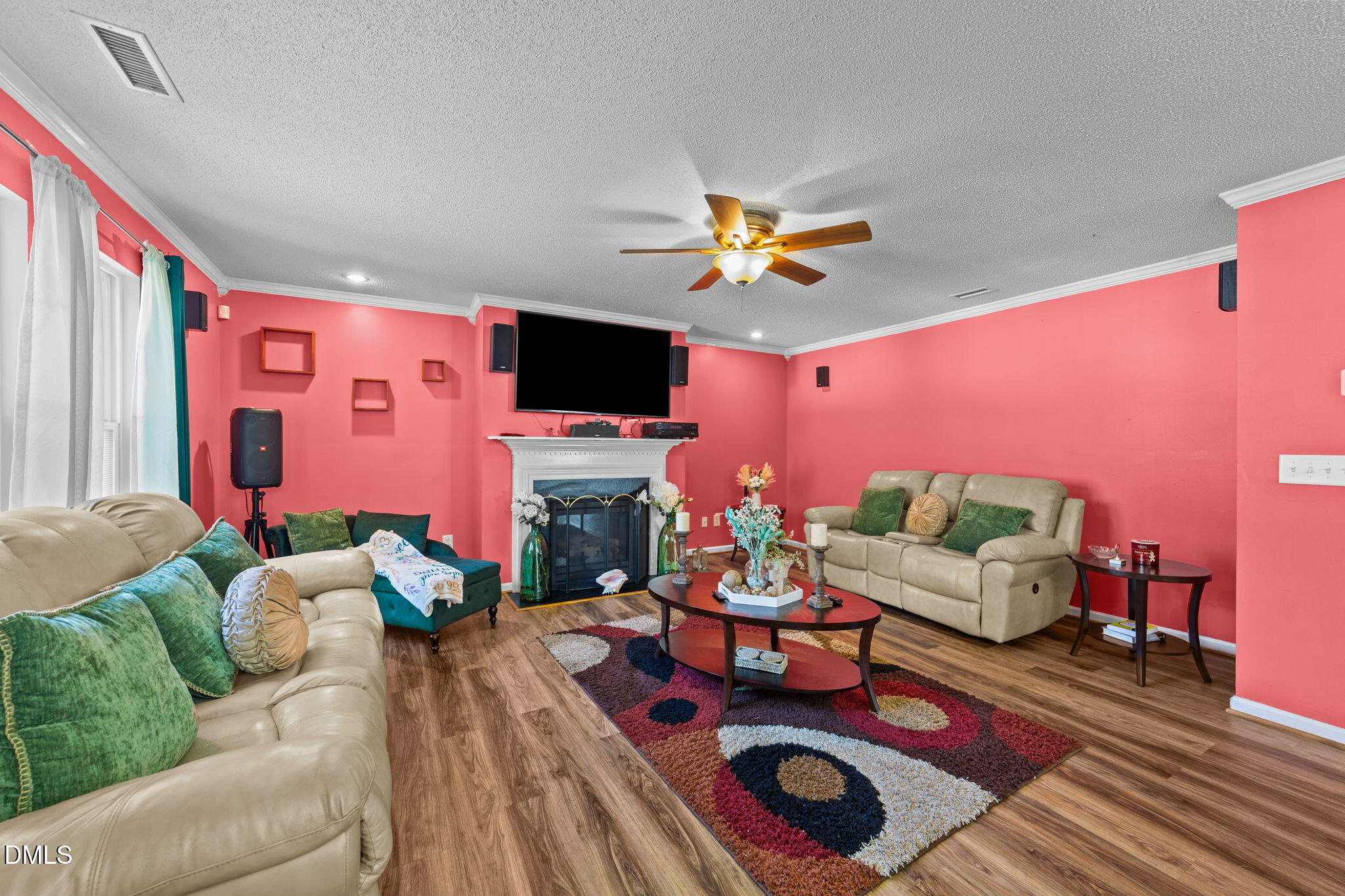 135 Oakton Ridge Place Garner, NC 27529 - Photo 14 of 40 a living room with furniture and a flat screen tv