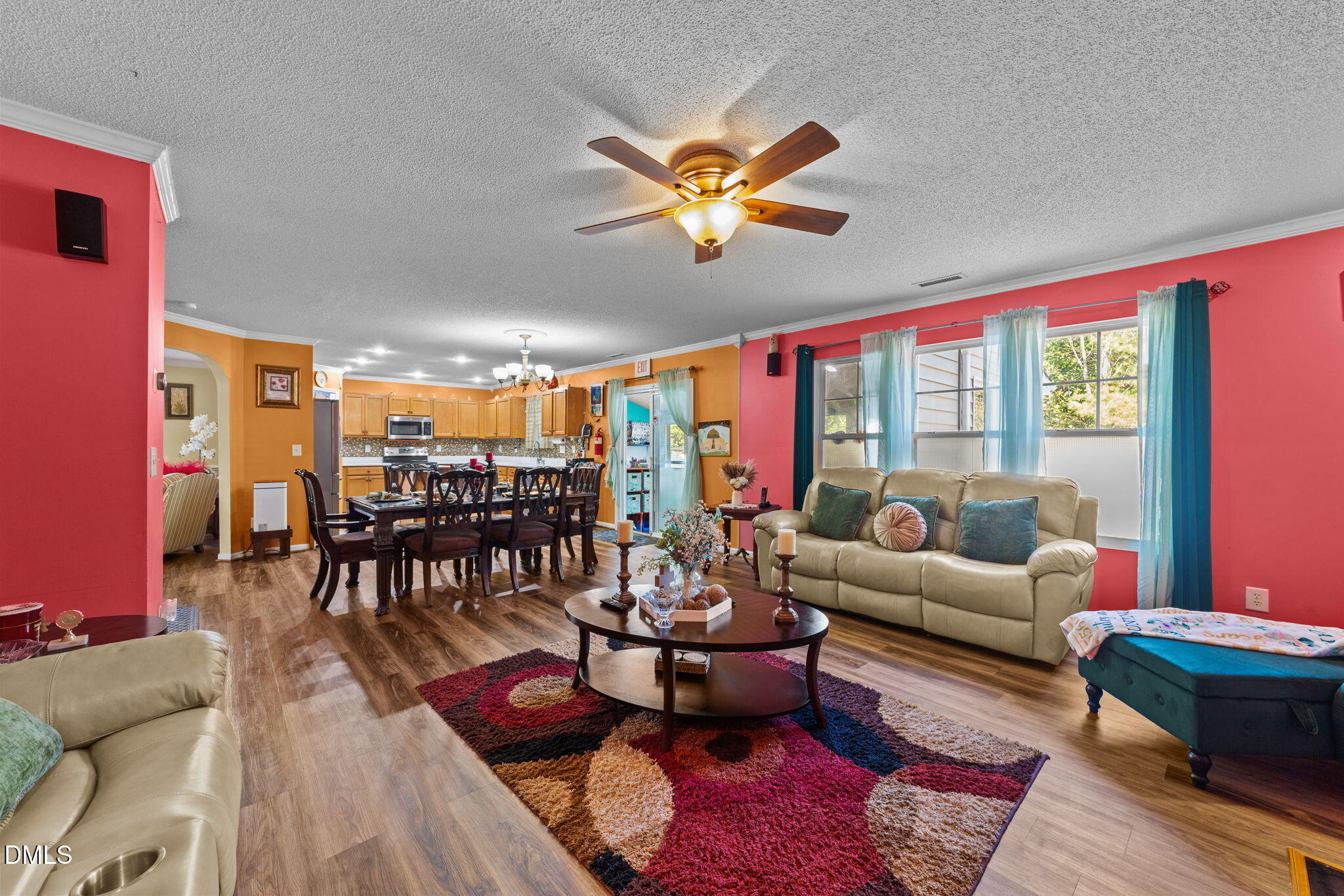 135 Oakton Ridge Place Garner, NC 27529 - Photo 15 of 40 a living room with furniture and a large window