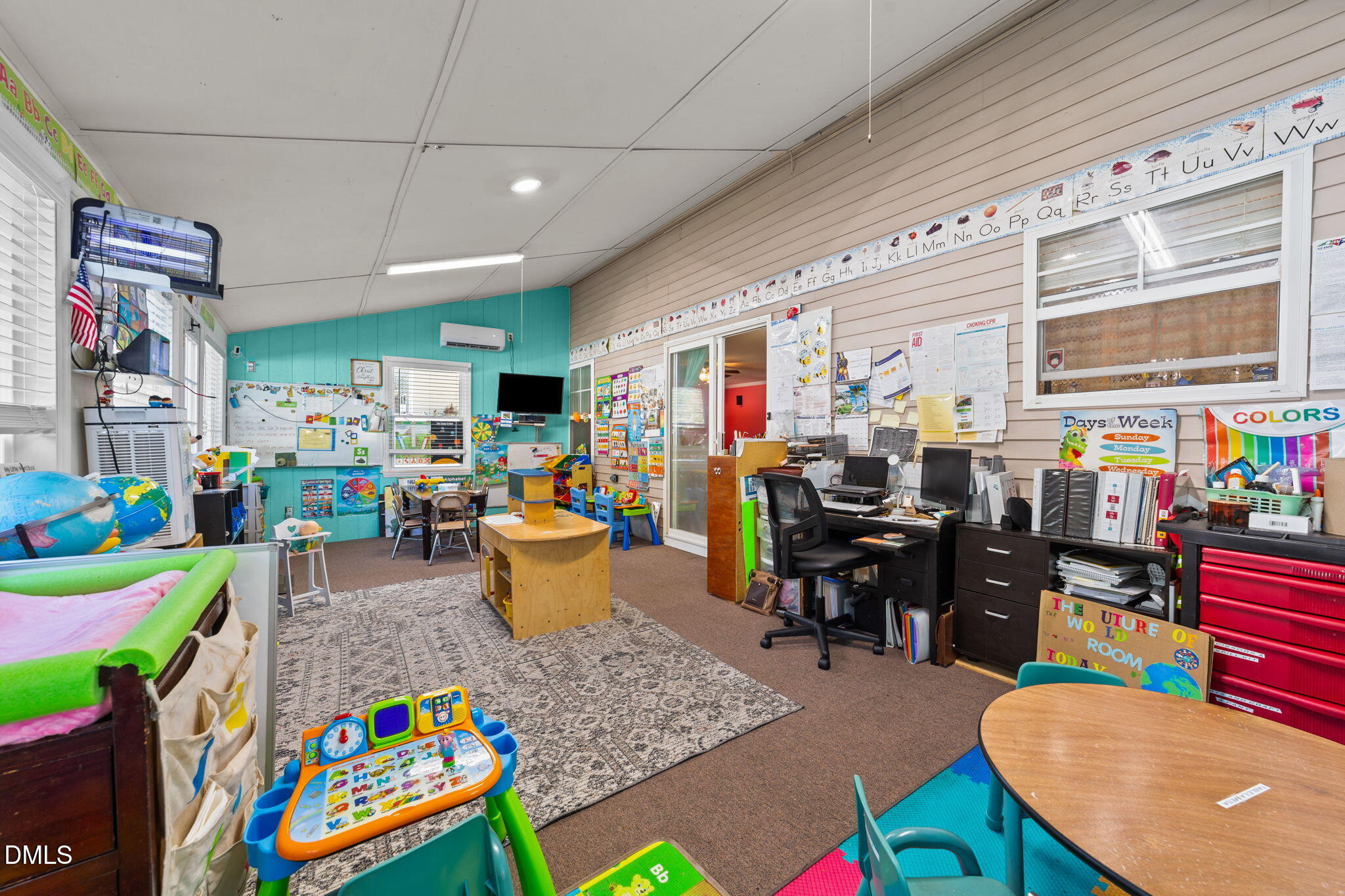 135 Oakton Ridge Place Garner, NC 27529 - Photo 17 of 40 a living room filled with furniture and a table