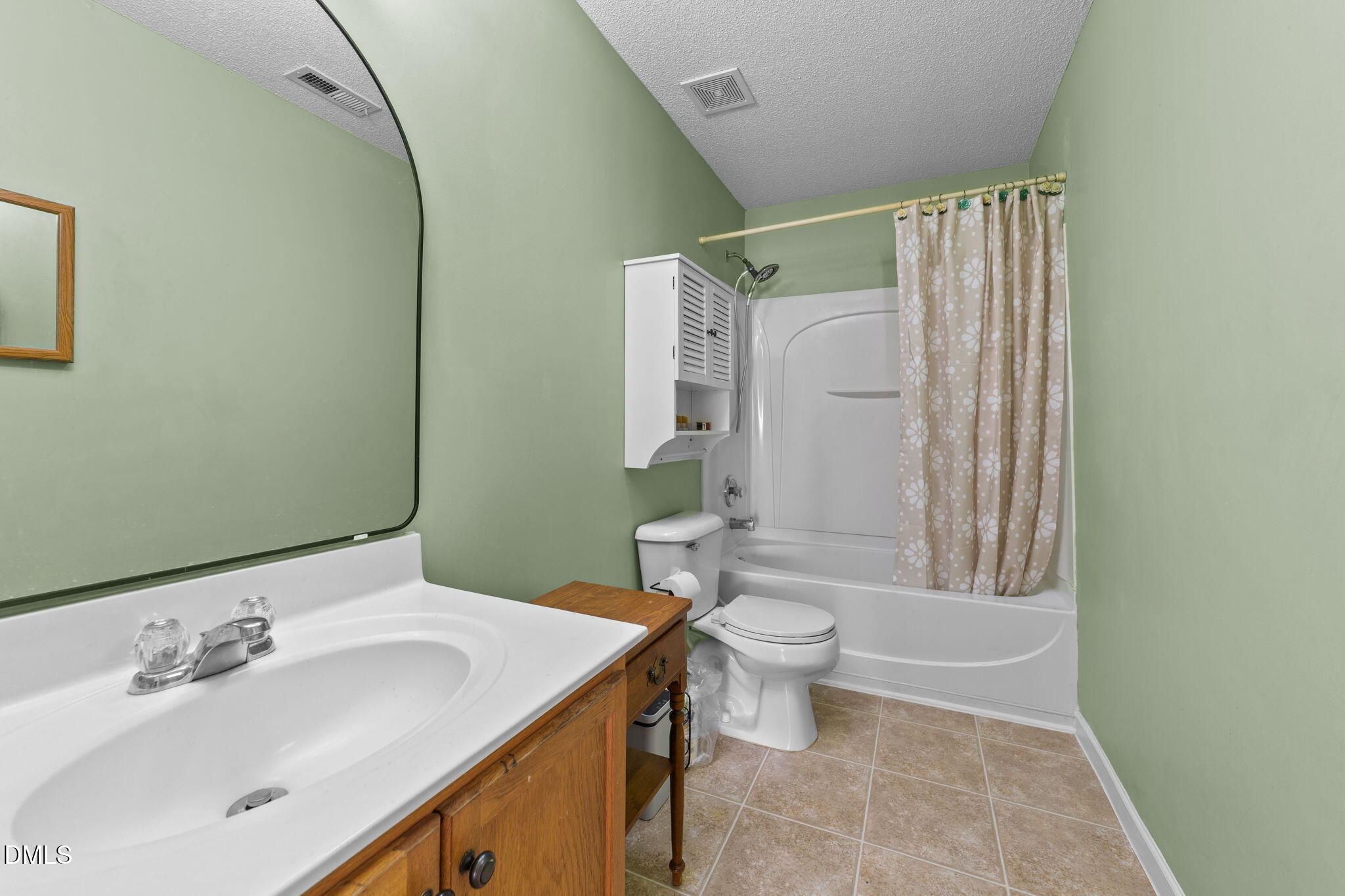135 Oakton Ridge Place Garner, NC 27529 - Photo 24 of 40 a bathroom with a sink toilet and shower