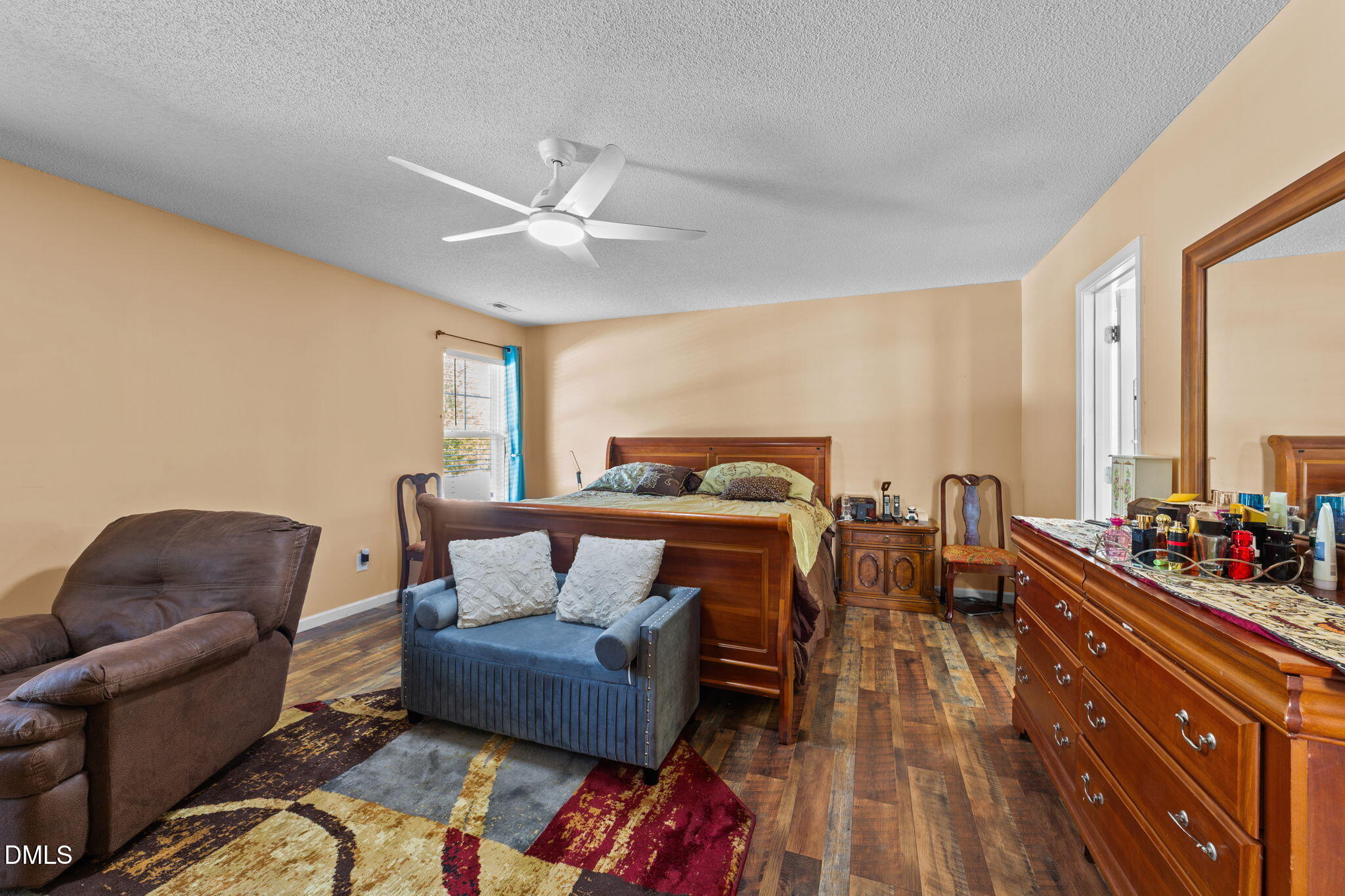 135 Oakton Ridge Place Garner, NC 27529 - Photo 25 of 40 a living room with furniture and wooden floor