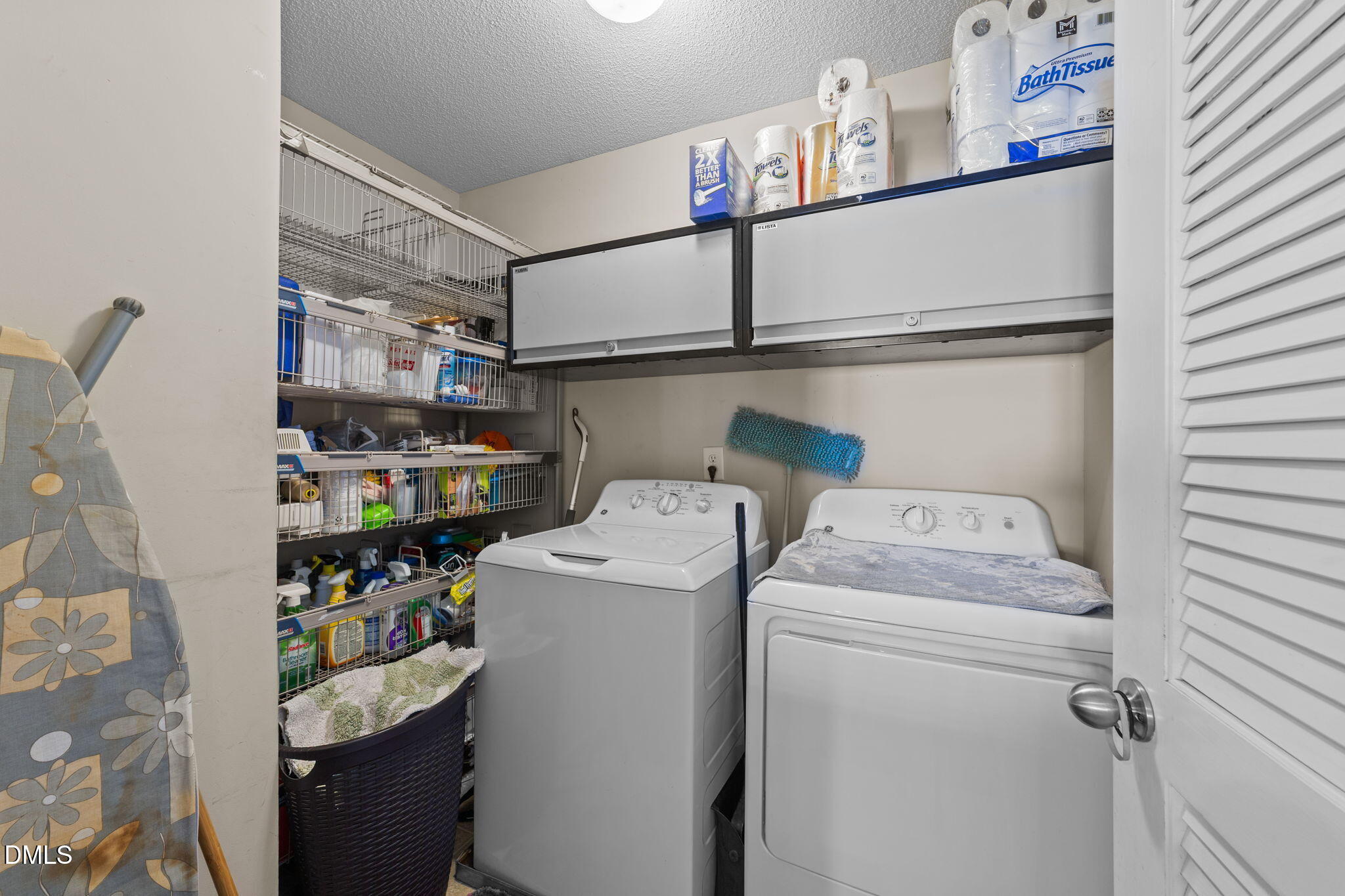 135 Oakton Ridge Place Garner, NC 27529 - Photo 30 of 40 a utility room with dryer and washer