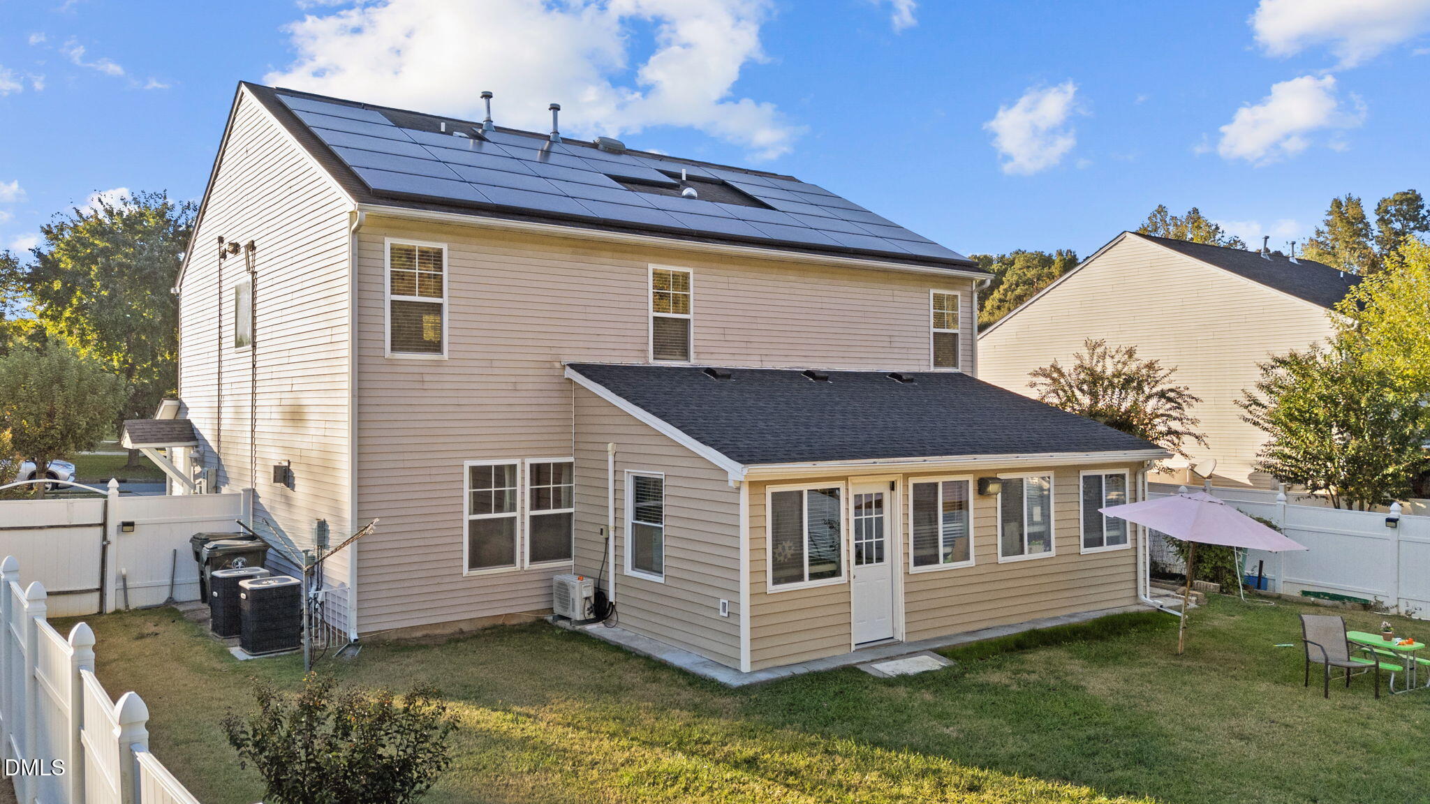 135 Oakton Ridge Place Garner, NC 27529 - Photo 33 of 40 a front view of a house with a garden