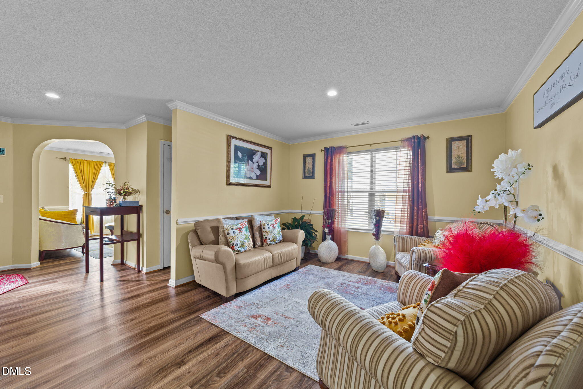 135 Oakton Ridge Place Garner, NC 27529 - Photo 7 of 40 a living room with furniture or couch and a wooden floor