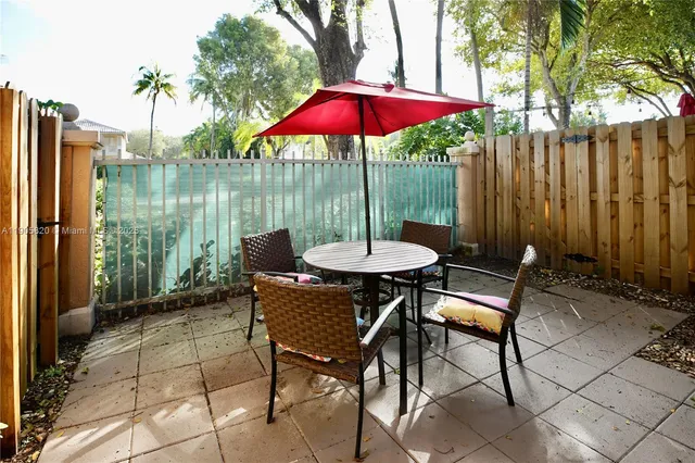 a patio view with a seating space