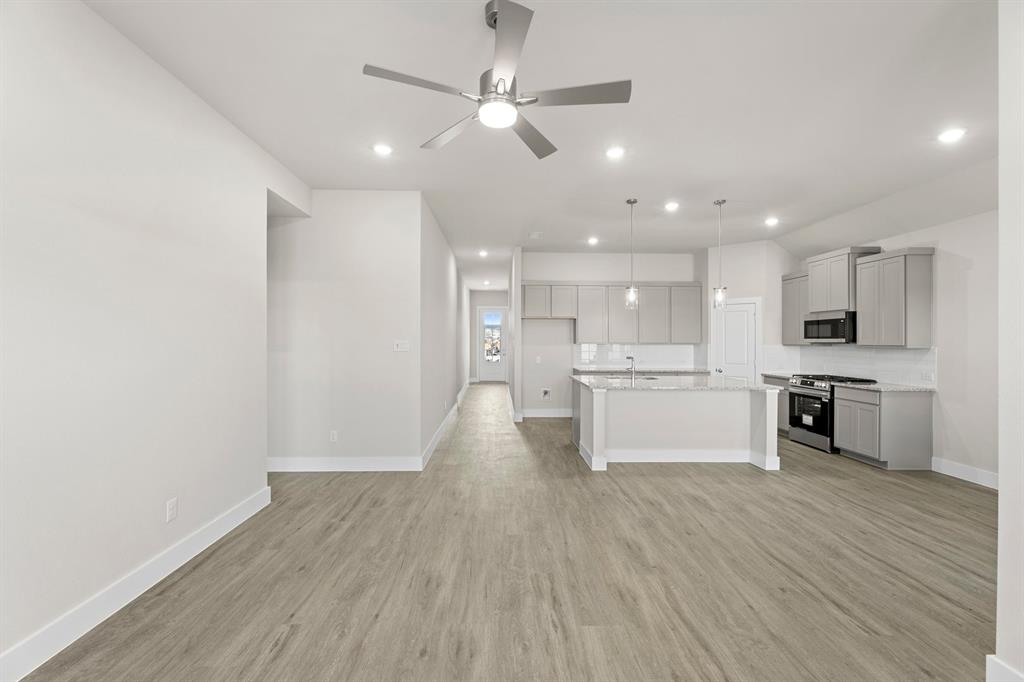 2372 Bell Way Forney, TX 75126 - Photo 11 of 39 a view of kitchen with wooden floor