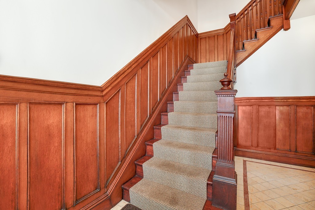 94 University Road, Unit 3 Brookline, MA 02446 - Photo 18 of 20 a view of entryway with wooden floor