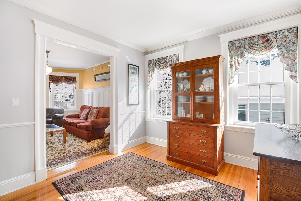 94 University Road, Unit 3 Brookline, MA 02446 - Photo 9 of 20 a living room with furniture and a window