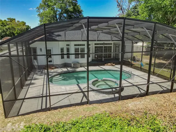 a house with trees in the background