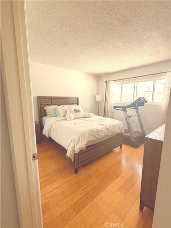 a bedroom with a bed and with view of bedroom