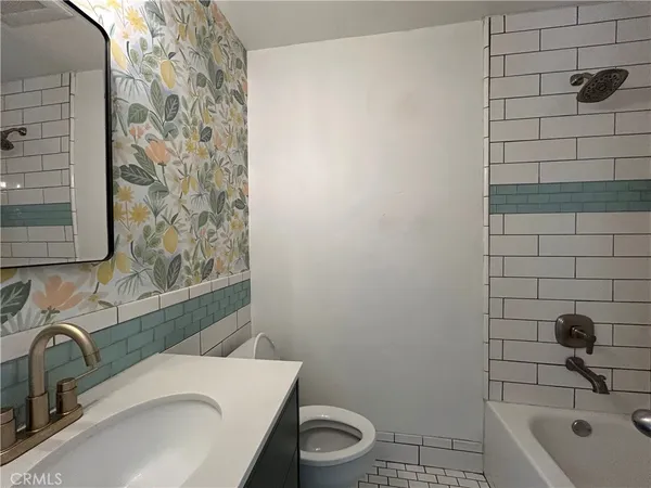 a bathroom with a sink and a toilet