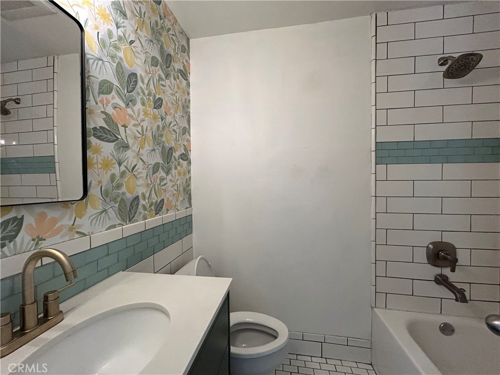 941 Marina Street Morro Bay, CA 93442 - Photo 20 of 36 a bathroom with a sink and a toilet