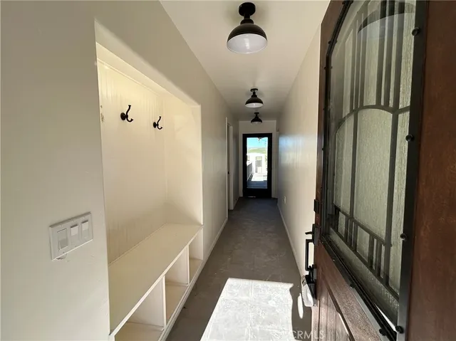 a view of a bathroom from the hallway