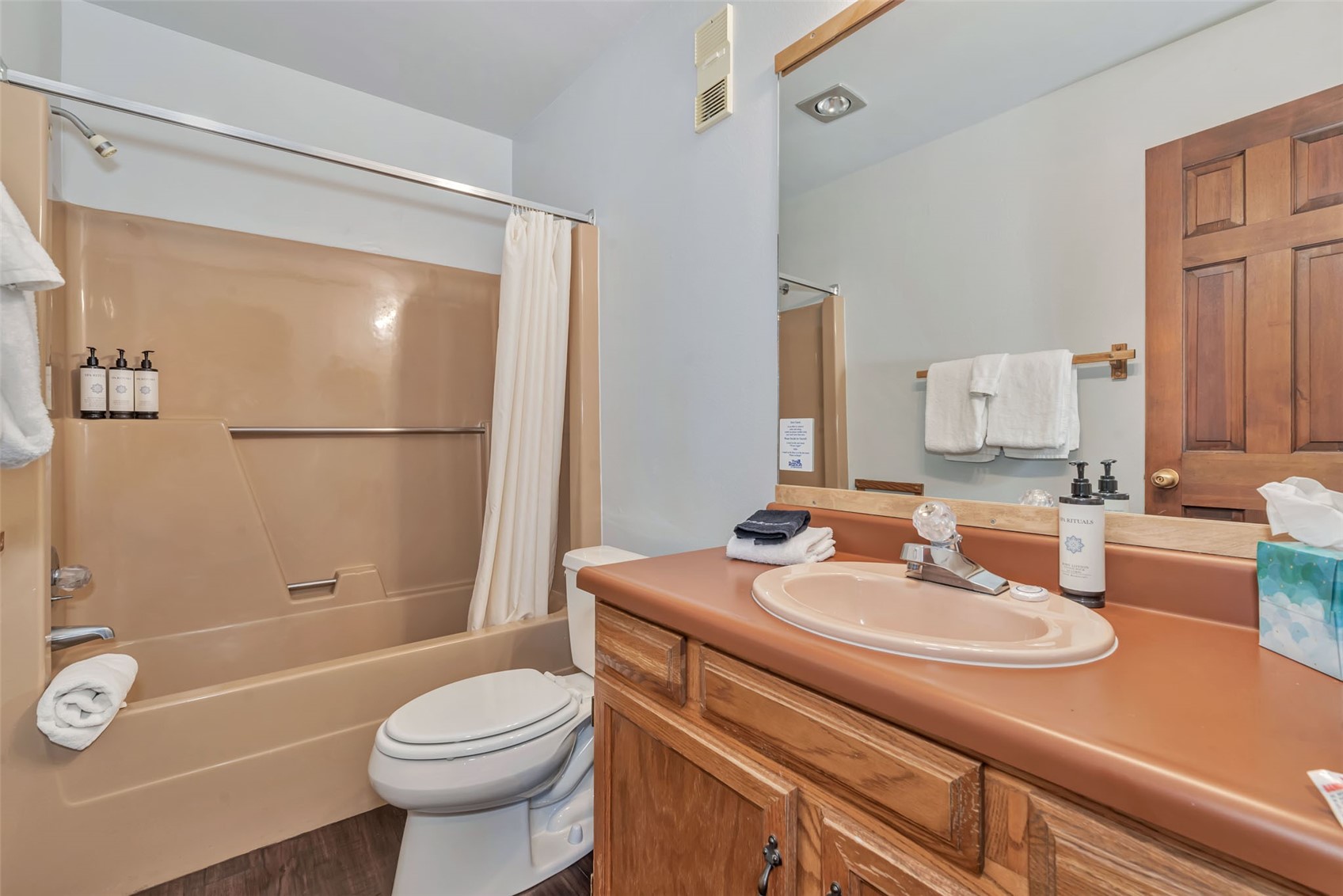 1720 Ranch Road, Unit 309 Steamboat Springs, CO 80487 - Photo 25 of 43 a bathroom with a sink toilet and shower