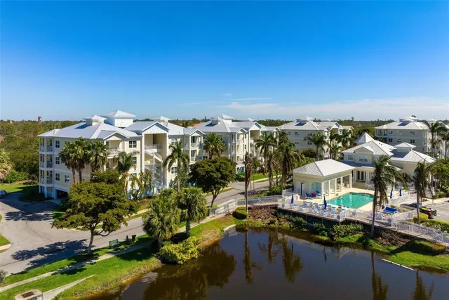 a view of a lake with sitting area