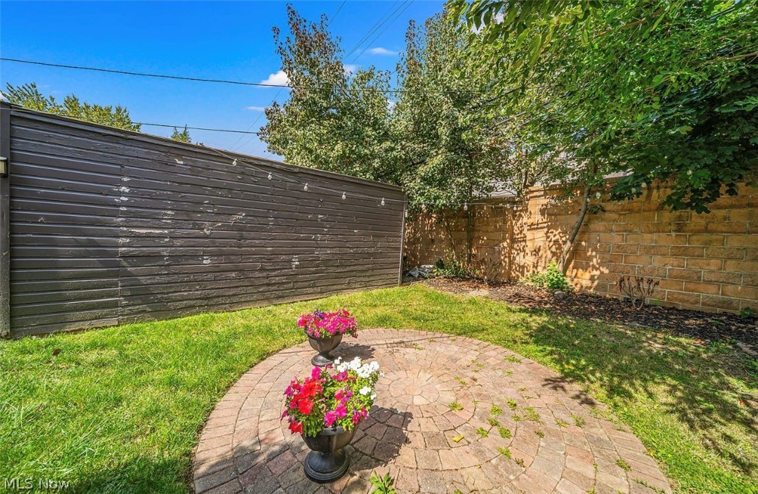 4069 Bushnell Road Cleveland, OH 44121 - Photo 36 of 39 Fenced backyard featuring a patio area