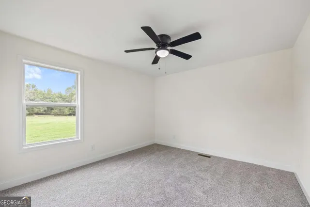 a view of deck with a floor to ceiling windows with wooden floor