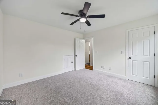 a big yard with lots of green space and mountain view