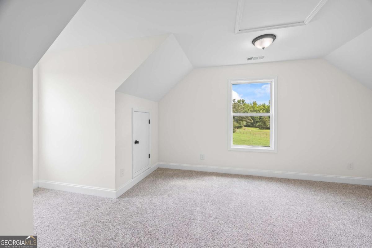 1718 Ed Bennett Road Nicholson, GA 30565 - Photo 55 of 70 an empty room with windows