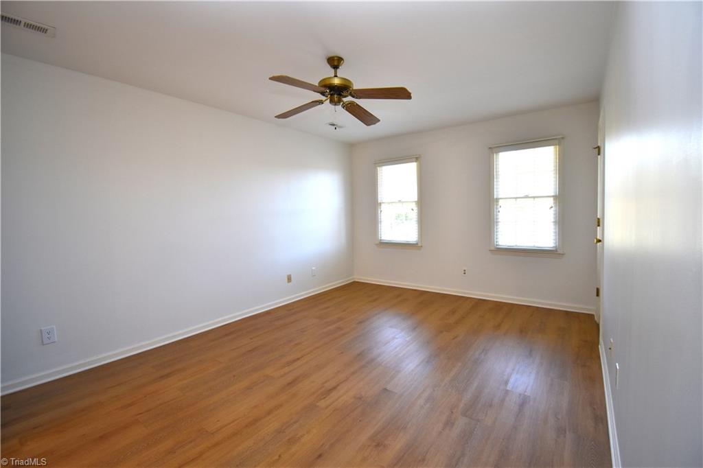422 Wildwood Lane Graham, NC 27253 - Photo 12 of 22 The primary bedroom features 2 separate closets (one a walk in).