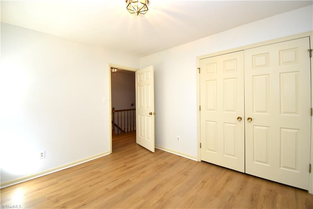 422 Wildwood Lane Graham, NC 27253 - Photo 17 of 22 Second view of guest bedroom #2 and its large closet.