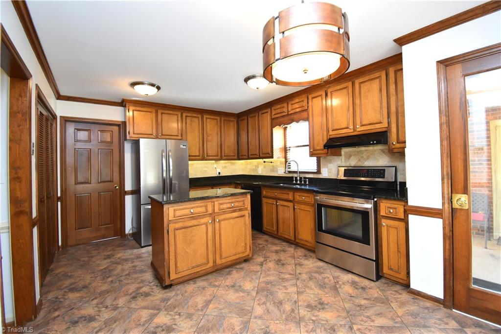 422 Wildwood Lane Graham, NC 27253 - Photo 2 of 22 Wow look at charm this kitchen has to offer.
