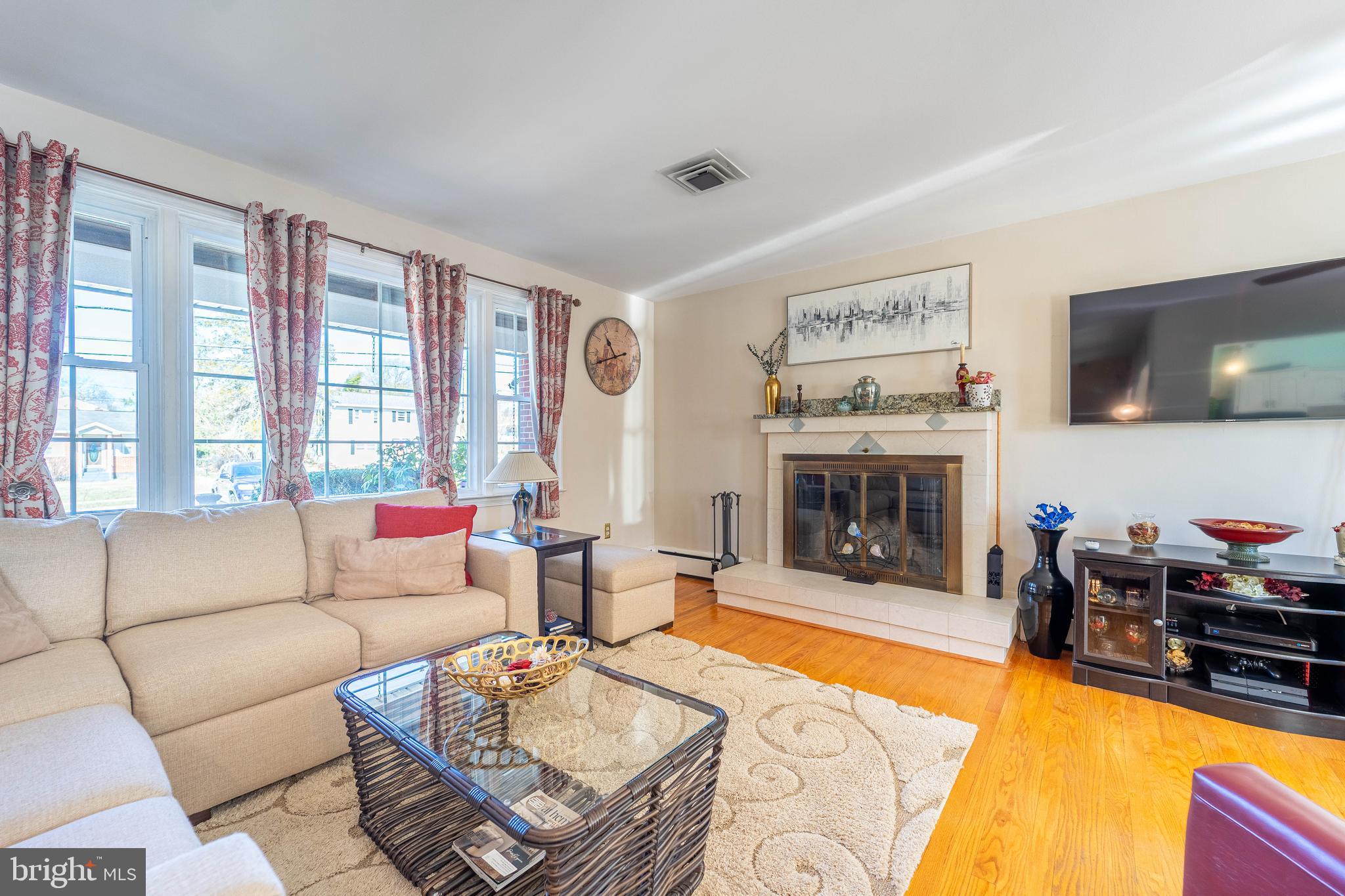 2321 Old Frederick Road Baltimore, MD 21228 - Photo 9 of 44 a living room with furniture fireplace and flat screen tv