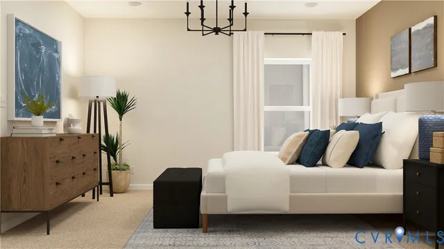 a bedroom with a bed and a potted plant