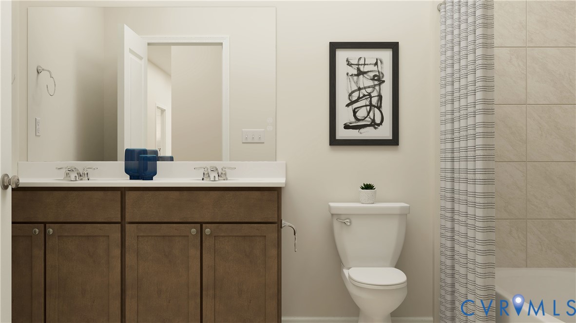 15712 Greenhart Drive Chesterfield, VA 23832 - Photo 14 of 32 a bathroom with a toilet sink and mirror