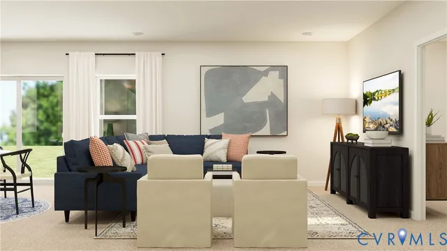 a living room with furniture and a large window