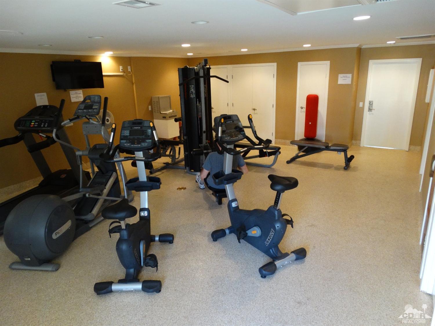43376 Cook Street, Unit 127 Palm Desert, CA 92211 - Photo 19 of 31 a view of a room with gym equipment