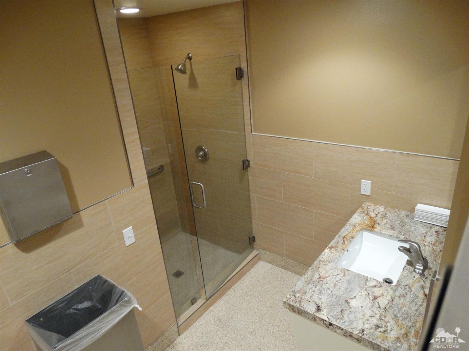 43376 Cook Street, Unit 127 Palm Desert, CA 92211 - Photo 26 of 31 a bathroom with a shower