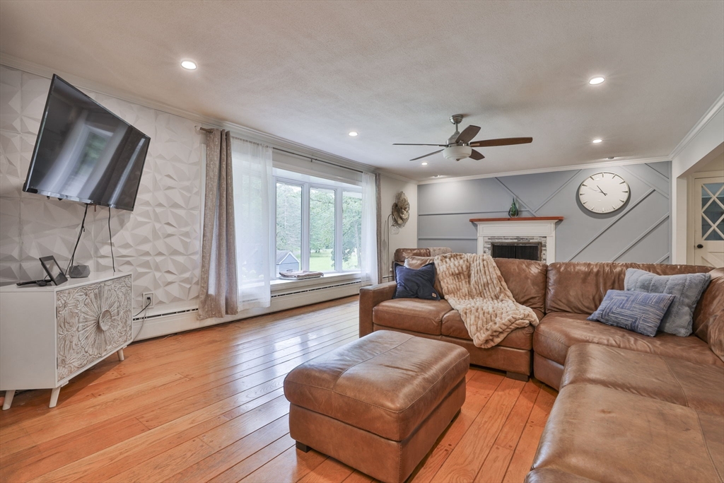 168 East Haynes Road Townsend, MA 01469 - Photo 4 of 23 a living room with furniture and a flat screen tv
