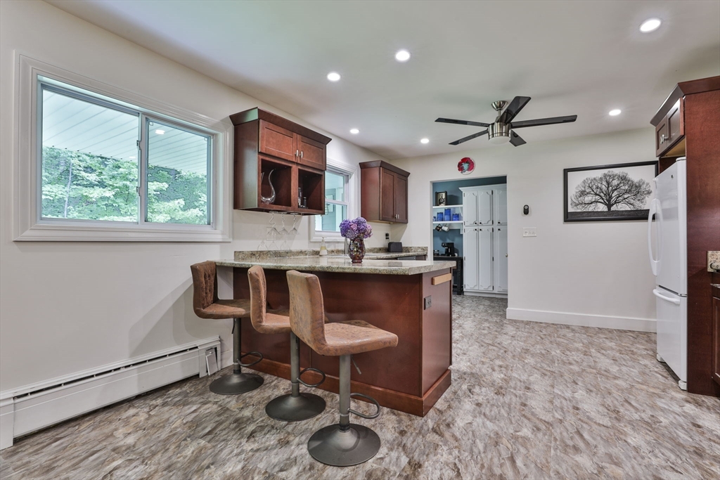 168 East Haynes Road Townsend, MA 01469 - Photo 5 of 23 a living room with furniture a flat screen tv and a window