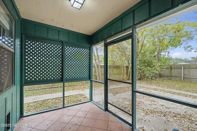 a view of a room with sliding glass door