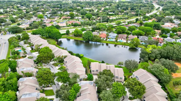 a view of a lake with a house in the background