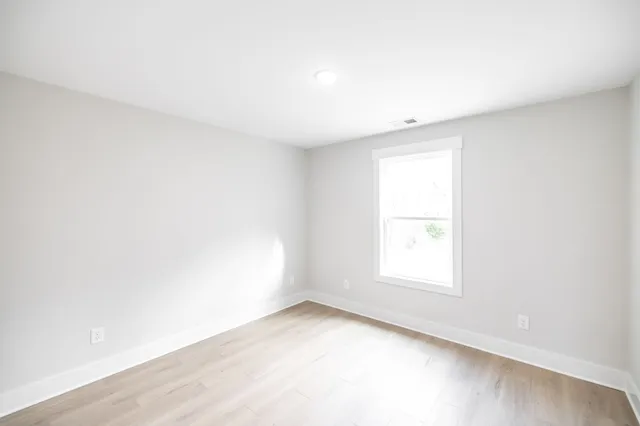 an empty room with a window