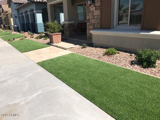 4156 East Cynthia Street Gilbert, AZ 85295 - Photo 11 of 25 a view of a house with a yard